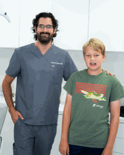 Happy patient with Dr. Zipper